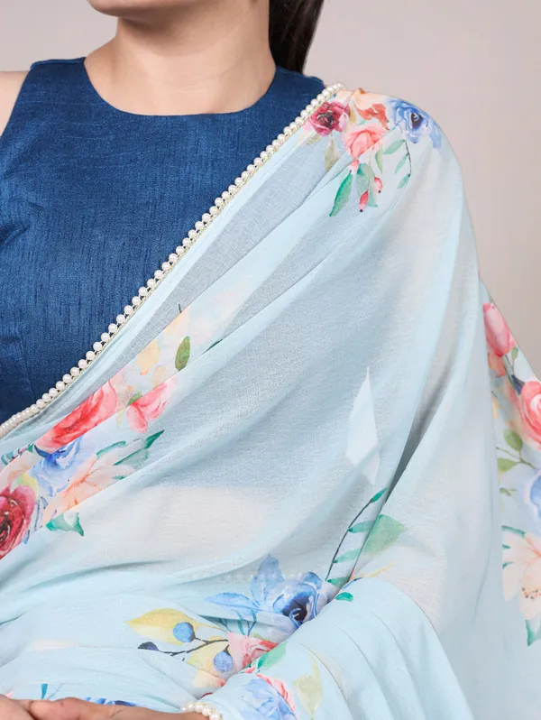 Blue_Georgett_Elegant_Pastel_Floral_Printed_Saree_With_Pearl_Border_For_Women