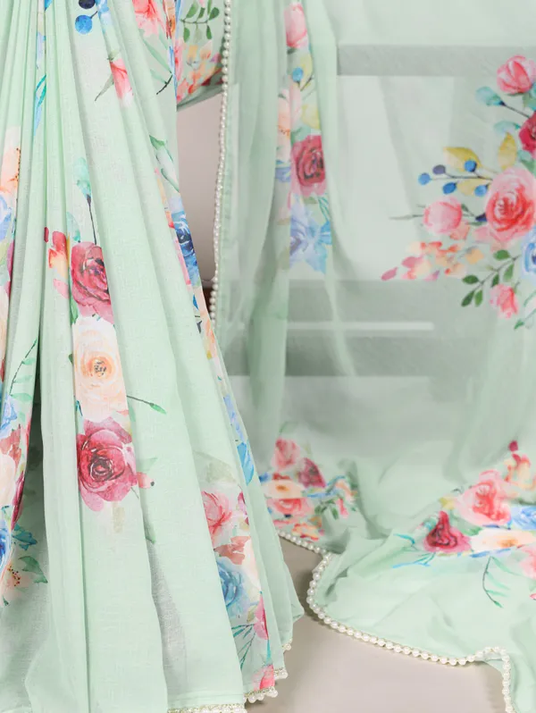 Green_Georgett_Elegant_Pastel_Floral_Printed_Saree_With_Pearl_Border_For_Women
