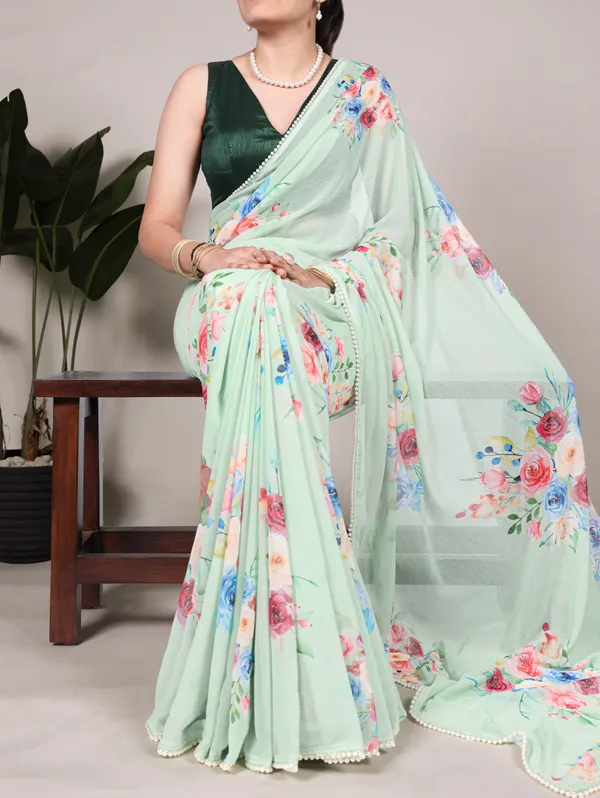 Green_Georgett_Elegant_Pastel_Floral_Printed_Saree_With_Pearl_Border_For_Women