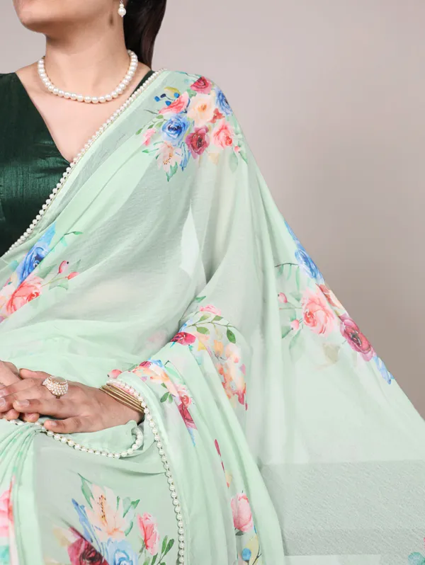 Green_Georgett_Elegant_Pastel_Floral_Printed_Saree_With_Pearl_Border_For_Women