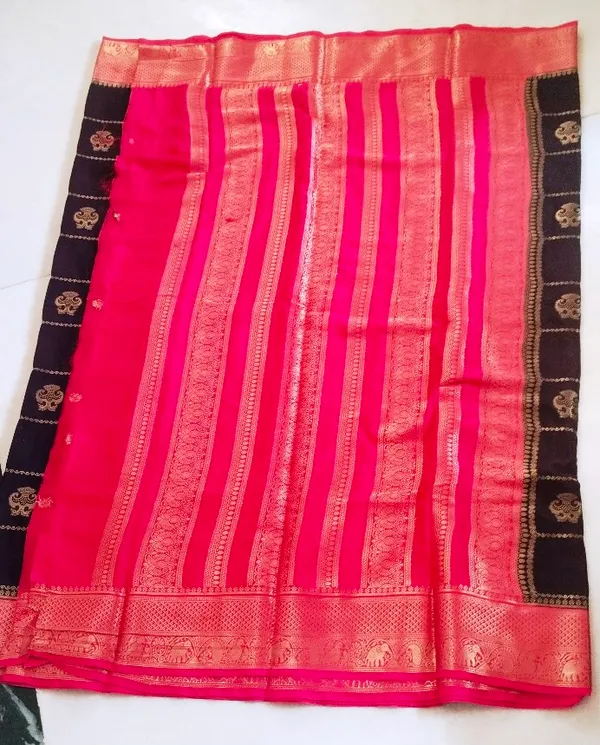 Trending_Gandabherunda_Motifs_With_Checks_Premium__Black_And_Pink_Contrast_Semi_Crepe__Saree