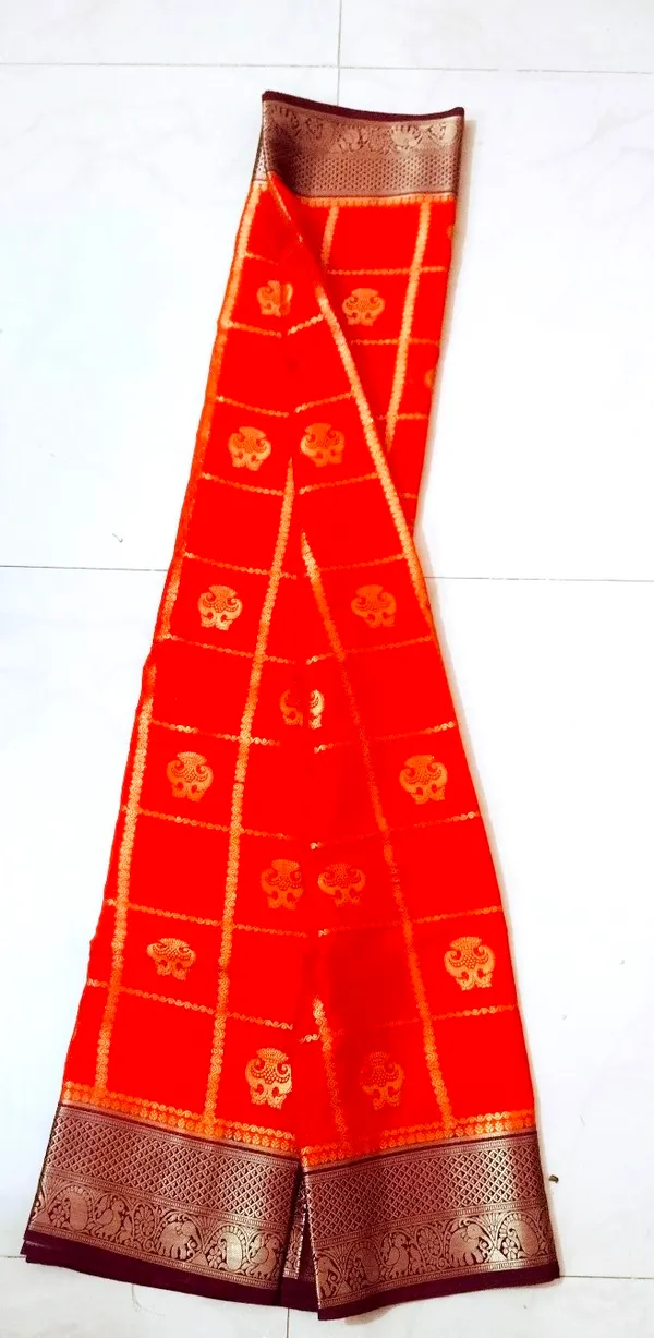 Trending_Rust_Orange_Semi_Crepe_Saree_With_Mejenta_Colour_Border