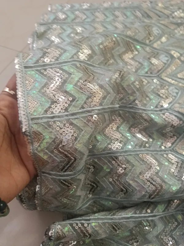 5.3_meter_Sea_blue_Knitted_Geometric_And_Floral_Sequin_Work_Fabric_With_Geometric_Borders_(unstitched)