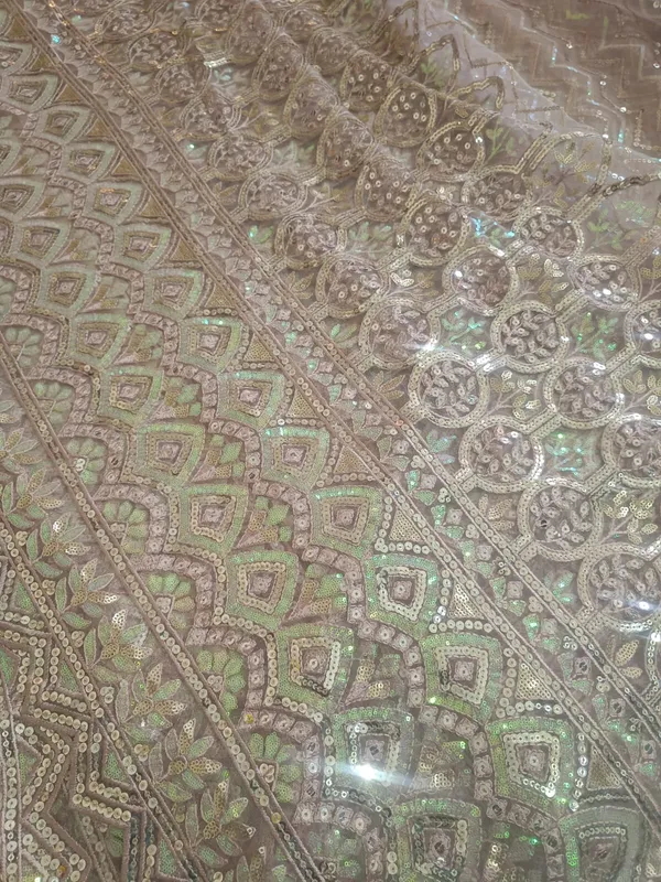 5.3__meter_Pastel_Pink_Knitted_Geometric_And_Floral_Sequin_Work_Fabric_With_Geometric_Borders_(unstitched)