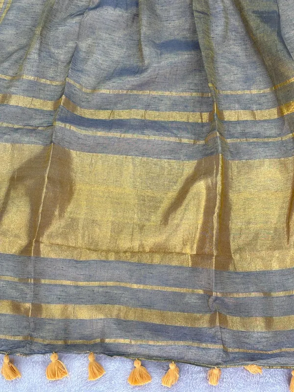 Tissue_crush_linen_silk_saree-_Blue_and_grey_colour_body_with_golden_zari_work