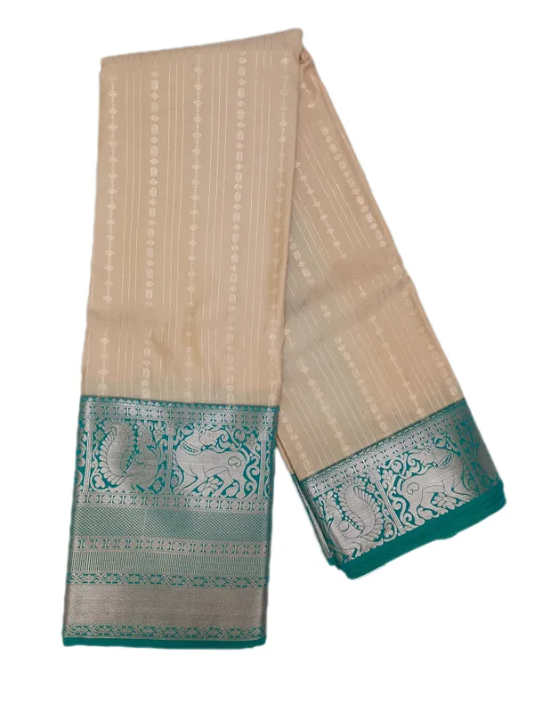 Luminous_Ivory_Soft_Cream_Emerald_Green_With_Silver_Zari_Elephant_And_Peacock_Motifs_Pure_Soft_Silk_Saree_With_Blouse