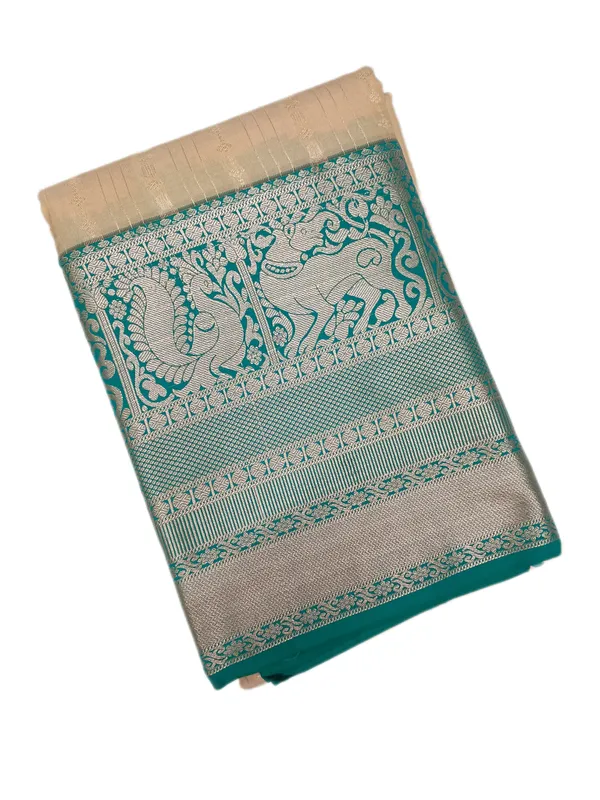 Luminous_Ivory_Soft_Cream_Emerald_Green_With_Silver_Zari_Elephant_And_Peacock_Motifs_Pure_Soft_Silk_Saree_With_Blouse