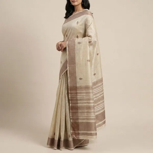 Natural_Ivory_Soft_Beige_With_Minimal_Leaf_Inspired_Woven_Buttas_And_Gold_Geometric_Woven_Border_Fancy_Soft_Silk_Saree_With_Blouse
