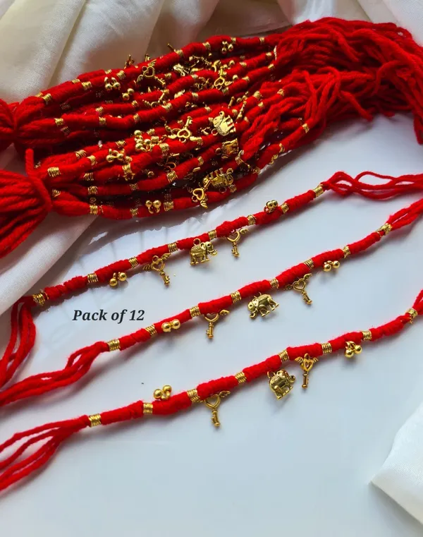 Auspicious_Elephant_Charm_Rakhi_with_Lucky_Key_and_Heart_Pendant_Red_Thread_Designer_Rakhi_for_Raksha_Bandhan