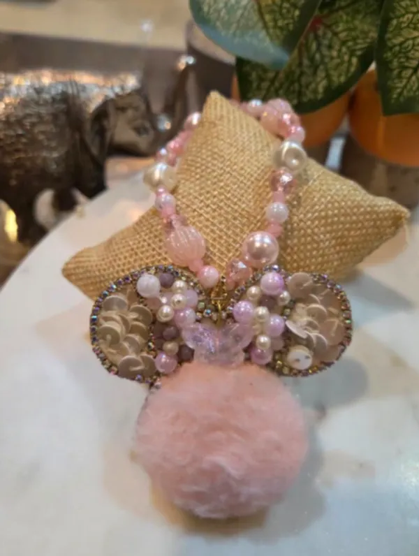Blush_Bow_Pom_Pom_Charm_Rakhi_for_Sister_Customizable_Designer_Raksha_Bandhan_Rakhi_with_Pearl_Beads