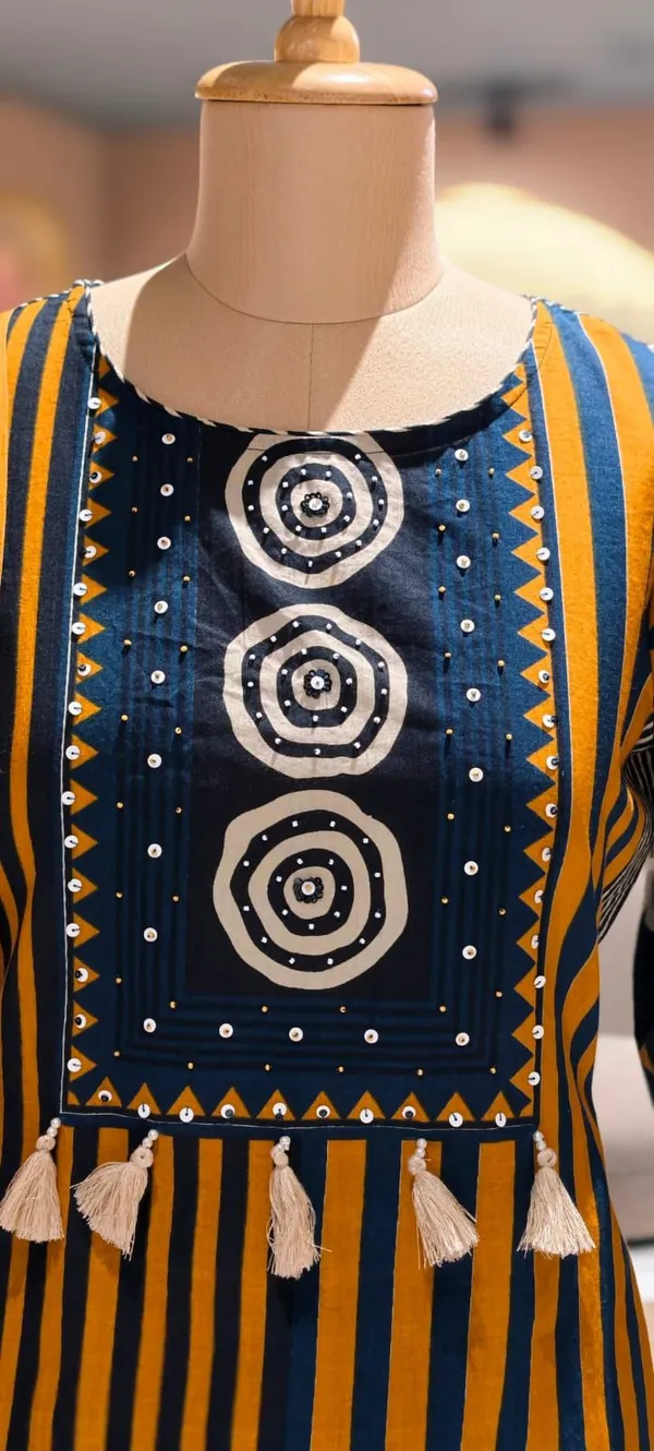 Contemporary_Ethnic_Striped_Cotton_Kurta_Set_with_Artistic_Dupatta_and_Coordinated_Pants