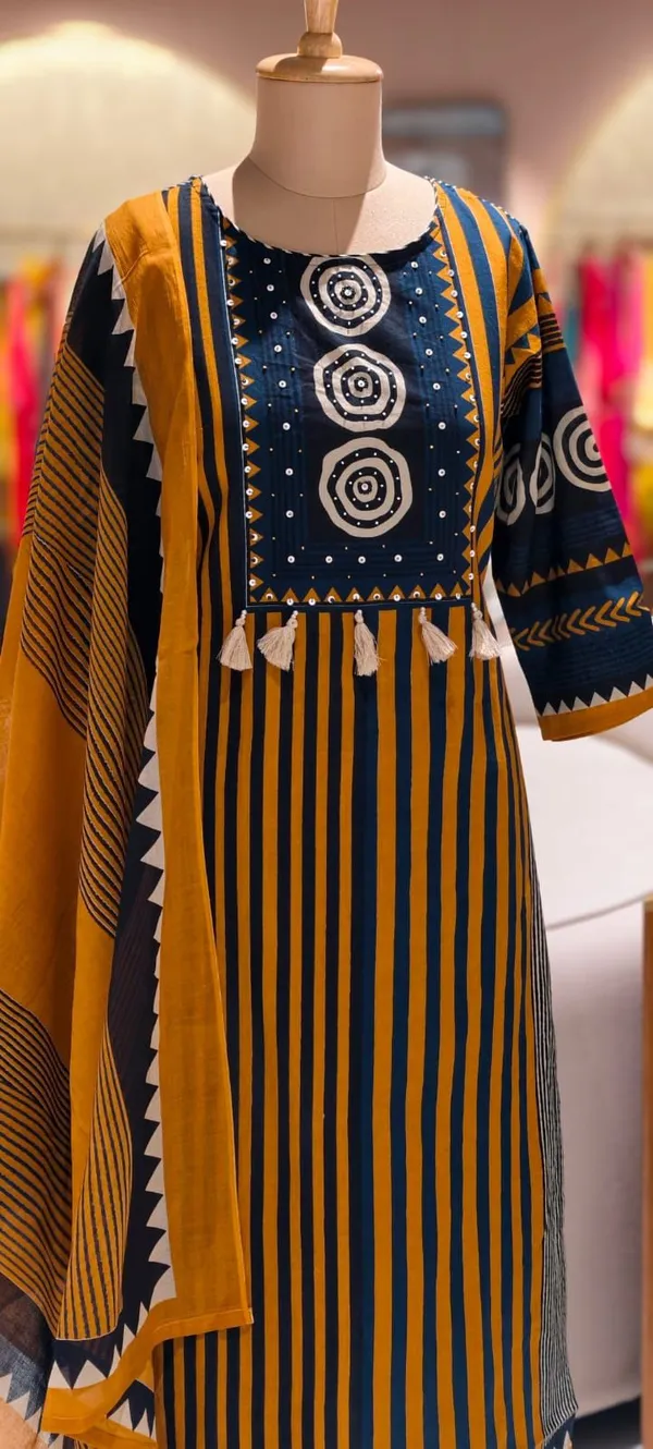 Contemporary_Ethnic_Striped_Cotton_Kurta_Set_with_Artistic_Dupatta_and_Coordinated_Pants