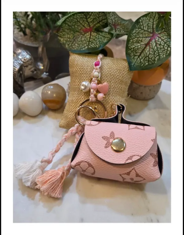 Cute_Blush_Handbag_Charm_Rakhi_with_Pearl_and_Heart_Accents_Handmade_Festive_Rakhi_Collection