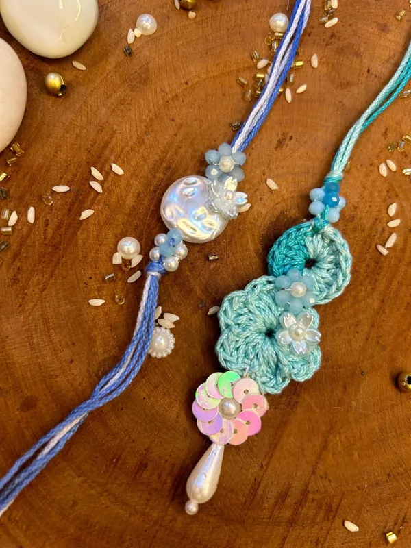 Handmade_Pastel_Bloom_Crochet_Rakhi_and_Lumba_Set_with_Pearl_Flower_Tassel_Designer_Raksha_Bandhan_Bhai_Bhabhi_Collection