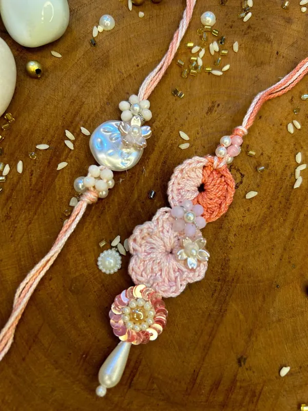 Handmade_Pastel_Bloom_Crochet_Rakhi_and_Lumba_Set_with_Pearl_Flower_Tassel_Designer_Raksha_Bandhan_Bhai_Bhabhi_Collection