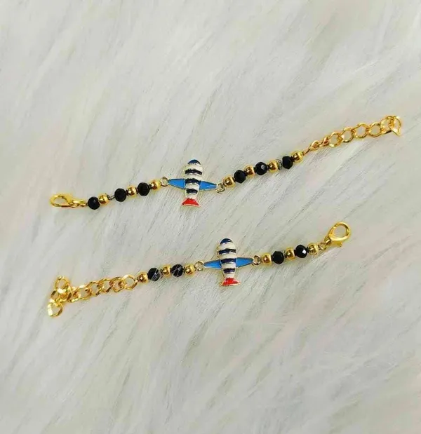 Cute__Nazariya_rakhi_for_the_cute__lil_one_with_very_tiny__hands_._Space_ship_theme__Can_be_bought_1-2_also_for_both_hands