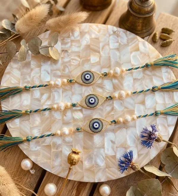 Luxury_Nazar_Protection_Rakhi_with_Pearl_Beads_Premium_Handmade_Designer_Sacred_Thread_for_Brother_Collection