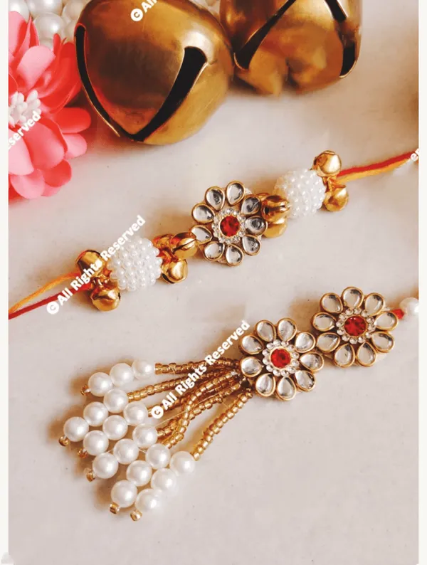 Jadau_flower_couple_rakhi_with_pearl_hanging