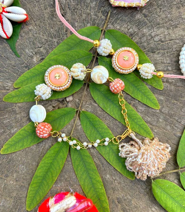 Stylish_and_elegant_Bracelet_set_with_pearl_hanging_.