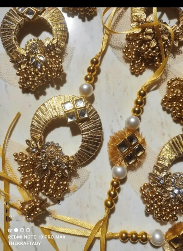 Golden_couple_rakhi_with_golden_hanging