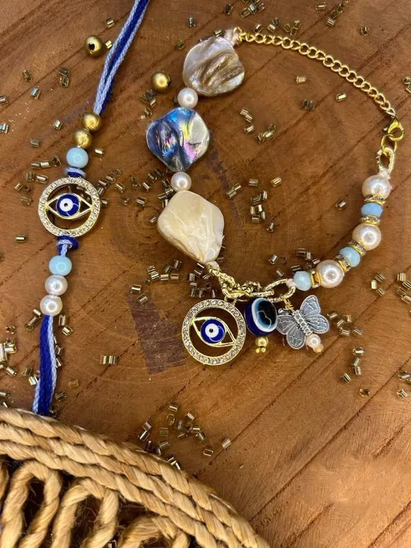Stylish_trendy_evil_eye_bracelet_set_with_mother_of_pearls_embellishment_._Comes_with_adjustable_chain