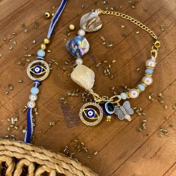 Stylish_trendy_evil_eye_bracelet_set_with_mother_of_pearls_embellishment_._Comes_with_adjustable_chain