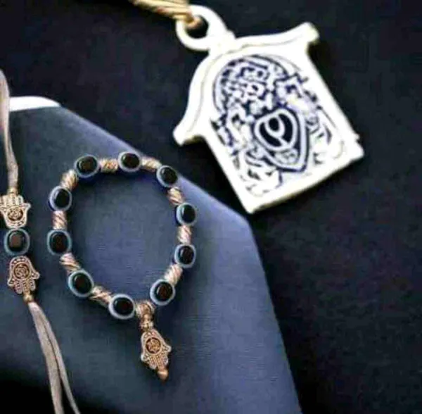Evil_eye_pair_with_Hamsa_hand_in_silver_finish