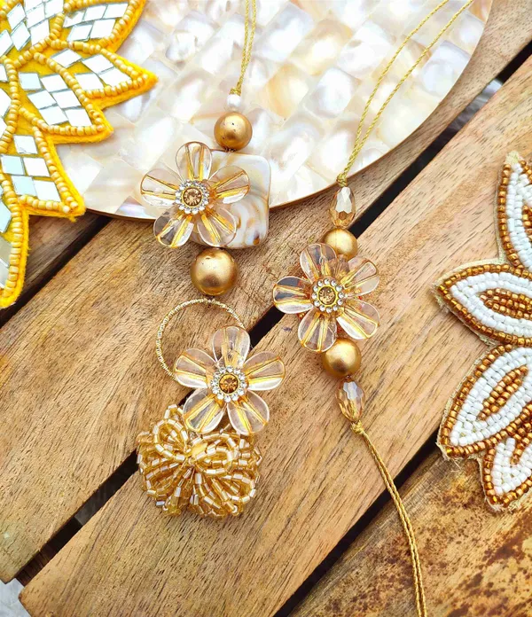 Flower_And_Gold_Thread_Couple_Rakhi