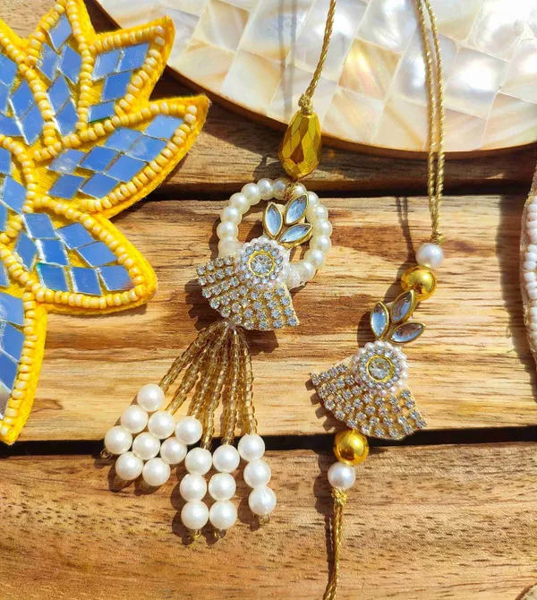 Beads_Stones_And_Gold_Thread_Couple_Rakhi