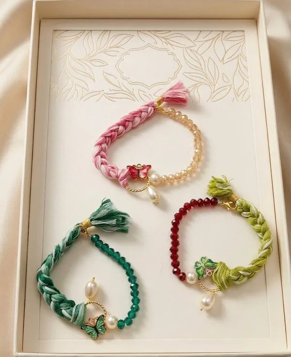 Pastel_Braided_Butterfly_Pearl_Bracelet_Rakhi_Elegant_Handmade_Beaded_Designer_Rakhi_for_Girls_Women_Raksha_Bandhan_Gift