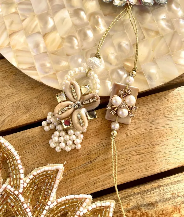 Pearl_Blossom_Bhai_Bhabhi_Rakhi_Set_with_Floral_Shell_Design_Handmade_Premium_Designer_Raksha_Bandhan_Lumba_Combo