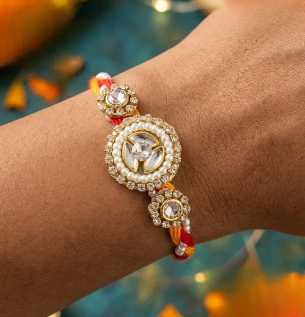 Pearl_Crest_Designer_Rakhi_with_Crystal_Center_and_Pearl_Halo_Handmade_Premium_Raksha_Bandhan_Thread_for_Brother_Gift