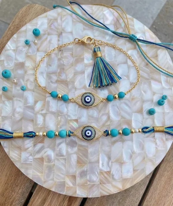 Premium_Blue_Evil_Eye_Rakhi_with_Matching_Gold_Chain_Bracelet_Handcrafted_Protective_Raksha_Bandhan_Collection