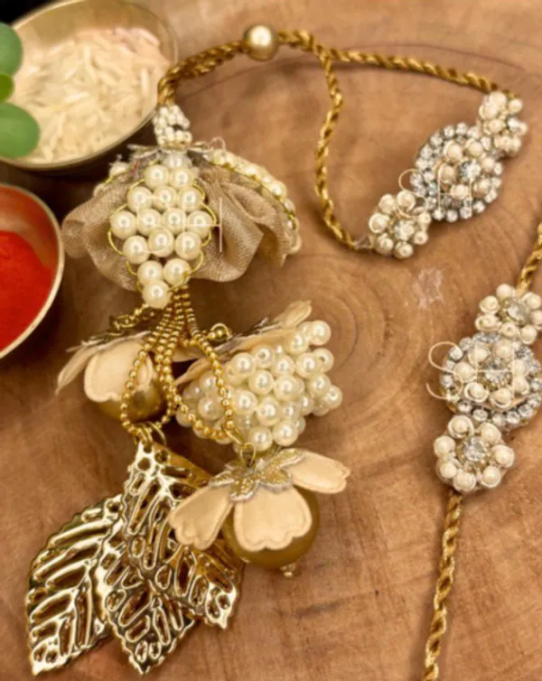 Premium_Handmade_Bhai_Bhabhi_Couple_Rakhi_Set_Pearl_Designer_Lumba_Rakhi_with_Floral_Charms_Golden_Leaf_Tassel_for_Raksha_Bandhan_Gift