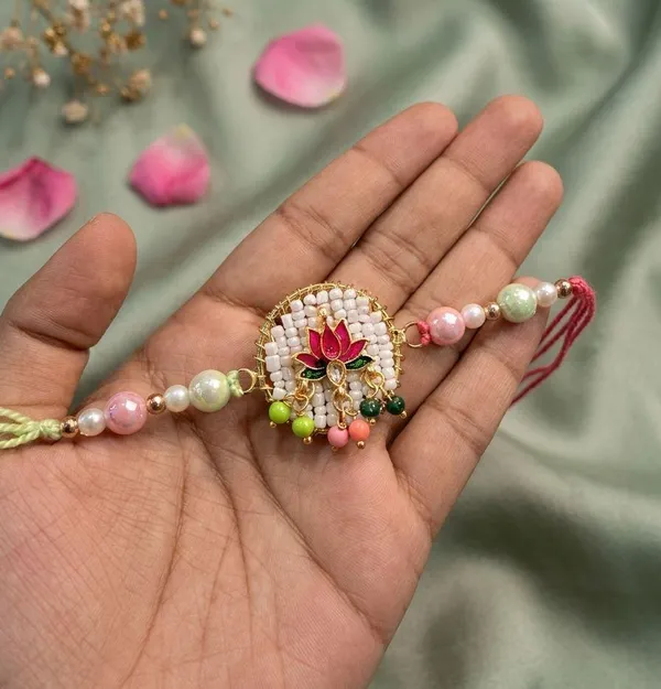 Premium_Lotus_Floral_Rakhi_|_Handcrafted_Beaded_Design_with_Pastel_Pearl_Accents