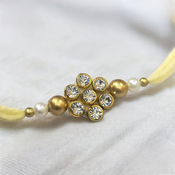 Royal_Handmade_Crystal_Floral_Rakhi_Designer_Stone_Rakhi_with_Pearl_Beads_Gold_Finish_for_Brother_Raksha_Bandhan_Gift