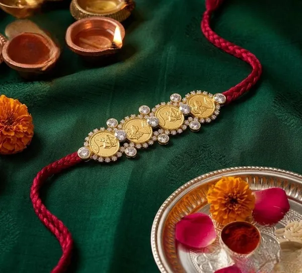 Royal_Lakshmi_Coin_Rakhi_with_Crystal_Halo_Design_Handmade_Premium_Designer_Raksha_Bandhan_Thread_for_Brother_Festive_Gift_Collection