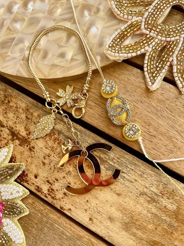Royal_Luxe_Charm_Rakhi_with_Crystal_Gold_Chanel_Handmade_Premium_Designer_Raksha_Bandhan_Thread_for_Brother_Gift