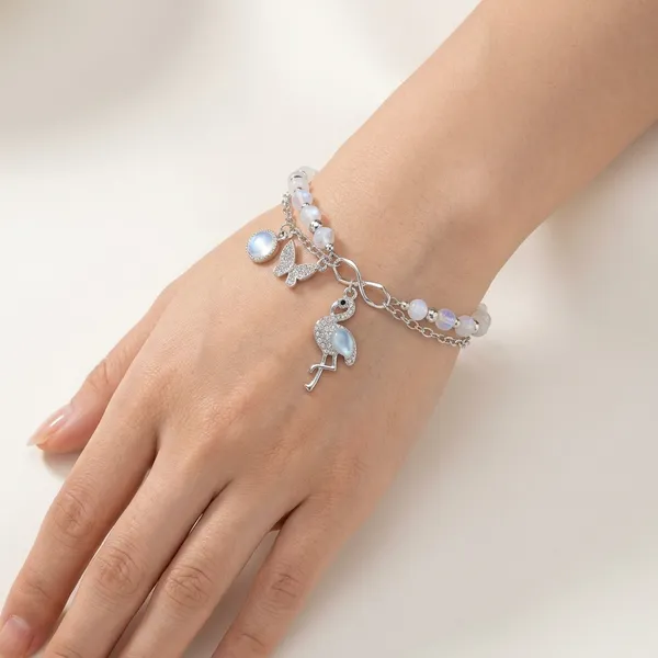 Premium_Silver_Charm_Bracelet_Rakhi_|_Flamingo_&_Butterfly_Charm_with_Moonstone_Beads
