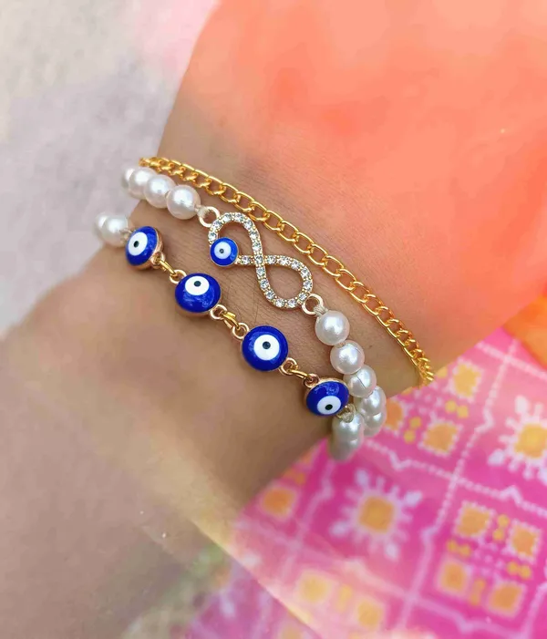 Evil_eye_bracelet_with_three_layers_chain_and_stone_studded_infinity_symbol_charm_which_gives_this_bracelet_very_trendy�look