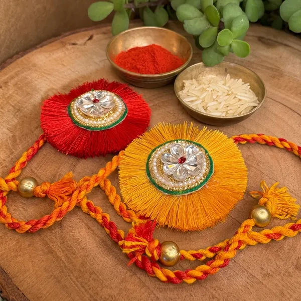 Elegant_Tassel_Designer_Rakhi_with_Crystal_Floral_Motif_Handcrafted_Raksha_Bandhan_Thread_for_Brothers_Exclusive_Festive_Gift_Collection