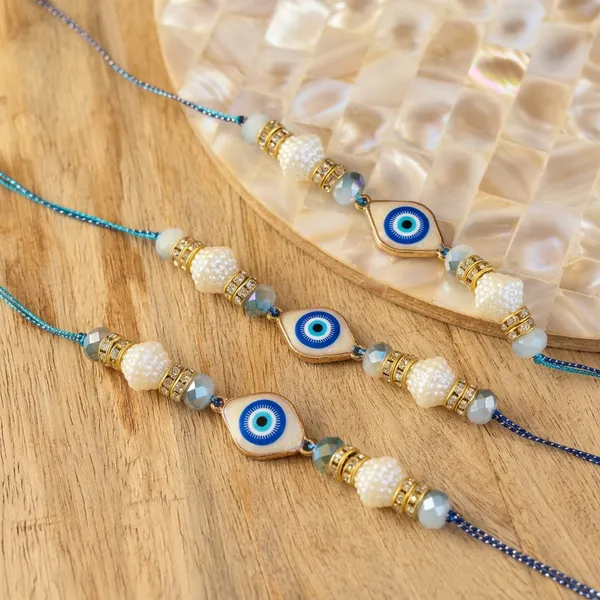 Premium_Evil_Eye_Pearl_Rakhi_with_Crystal_Beads_Handmade_Designer_Raksha_Bandhan_Thread_for_Brother_Protective_Gift_Collection