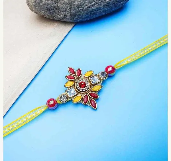 Beautiful_red_and_yellow_design_with_kundan_on_centre