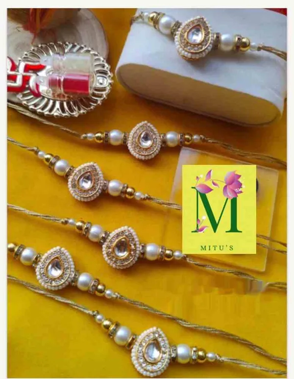 Pearl_and_Kundan_rakhi_with_golden_thread