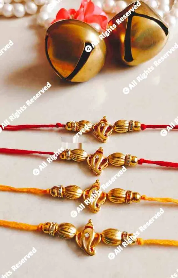 simple_elegant_rakhi_with_ganesha_design_in_gold