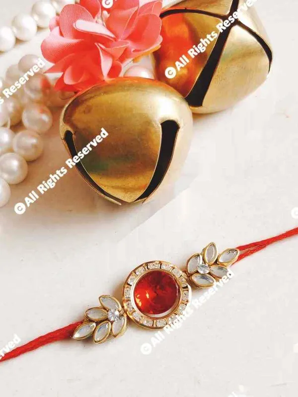 Red_crystal_motif_with_kundan_leaf_on_sides