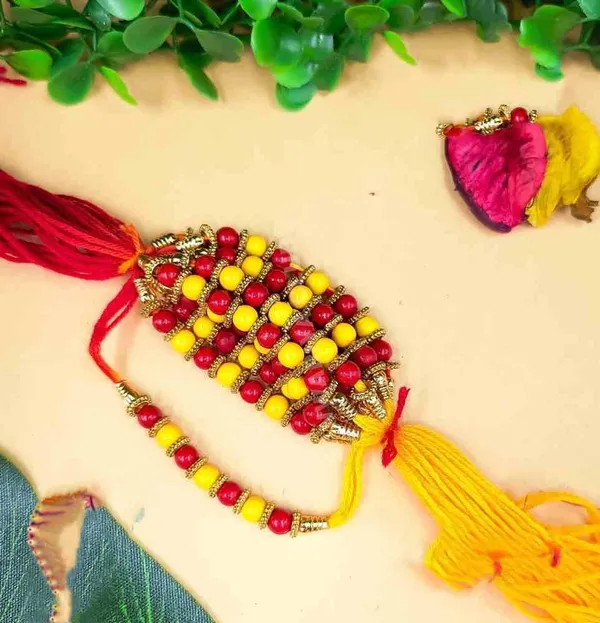 Moli_saadi_rakhi_with_yellow_and_red_bead
