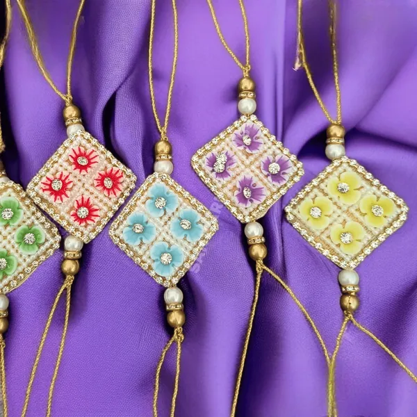 Beautiful_Diamond_Shaped_Rakhi_With_Shining_Stones