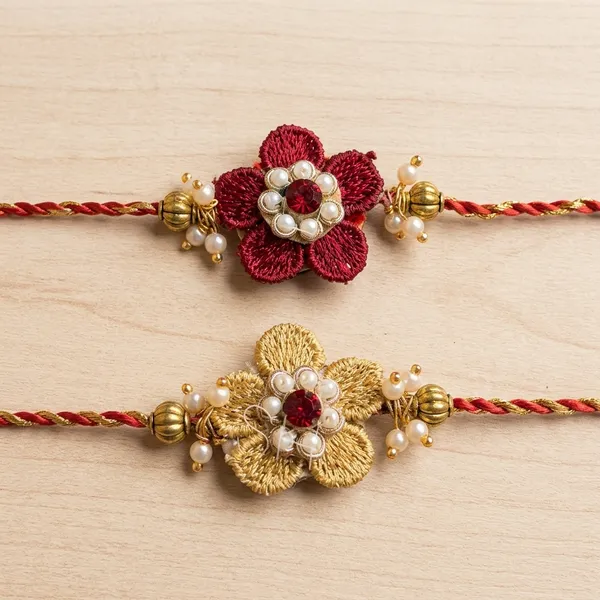 Elegant_Embroidered_Flower_Rakhi_Pair_with_Pearl_and_Bead_Embellishments_Handmade_Raksha_Bandhan_Sacred_Thread_for_Brothers_Collection
