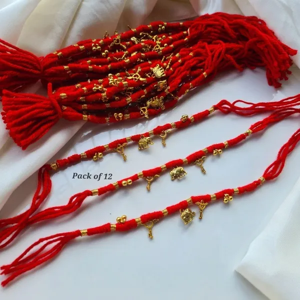 Auspicious_Elephant_Charm_Rakhi_with_Lucky_Key_and_Heart_Pendant_Red_Thread_Designer_Rakhi_for_Raksha_Bandhan